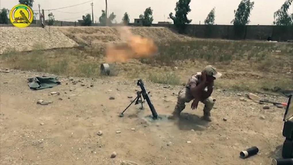 Iraqi Popular Mobilization Unit Launching Mortar Attack on ISIS positions; Fallujah, Iraq, July 2015