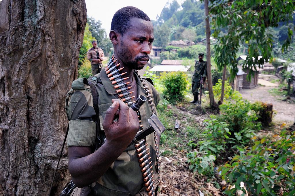 M23 Rebel Brandishing Arms ; Bunagana, DRC, July 2012