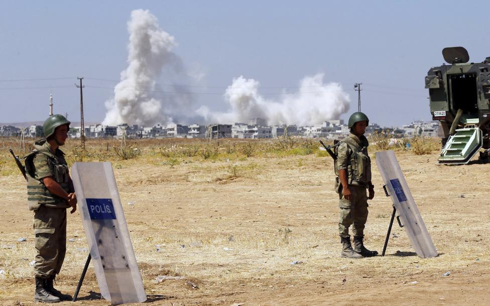 Turkish Soldiers on Guard in Suruc While Some Rises From Kobane, Syria; June 2015