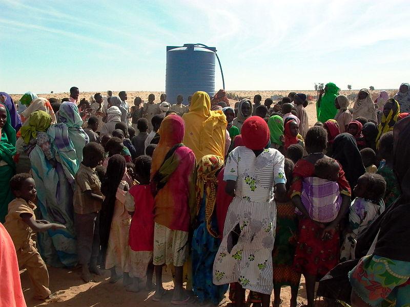 Darfuri Internally Displaced Persons at a Water Tank; Darfur, Sudan, 2007