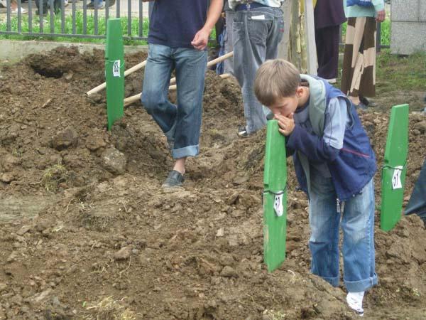 Boy at Grave in Srebrenica