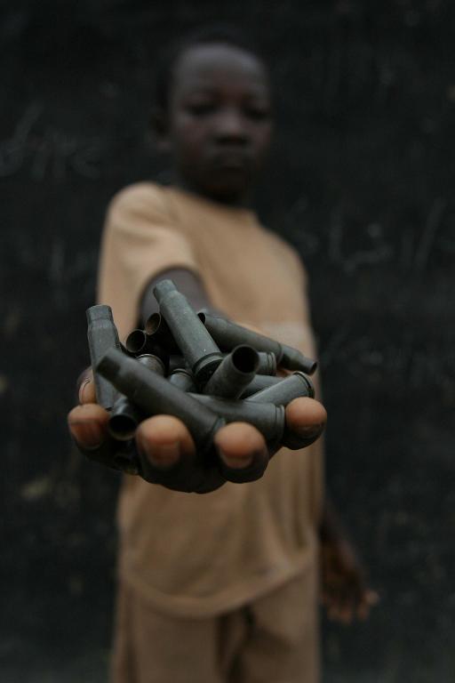 Child with Shell Casings, Central African Republic, 2007