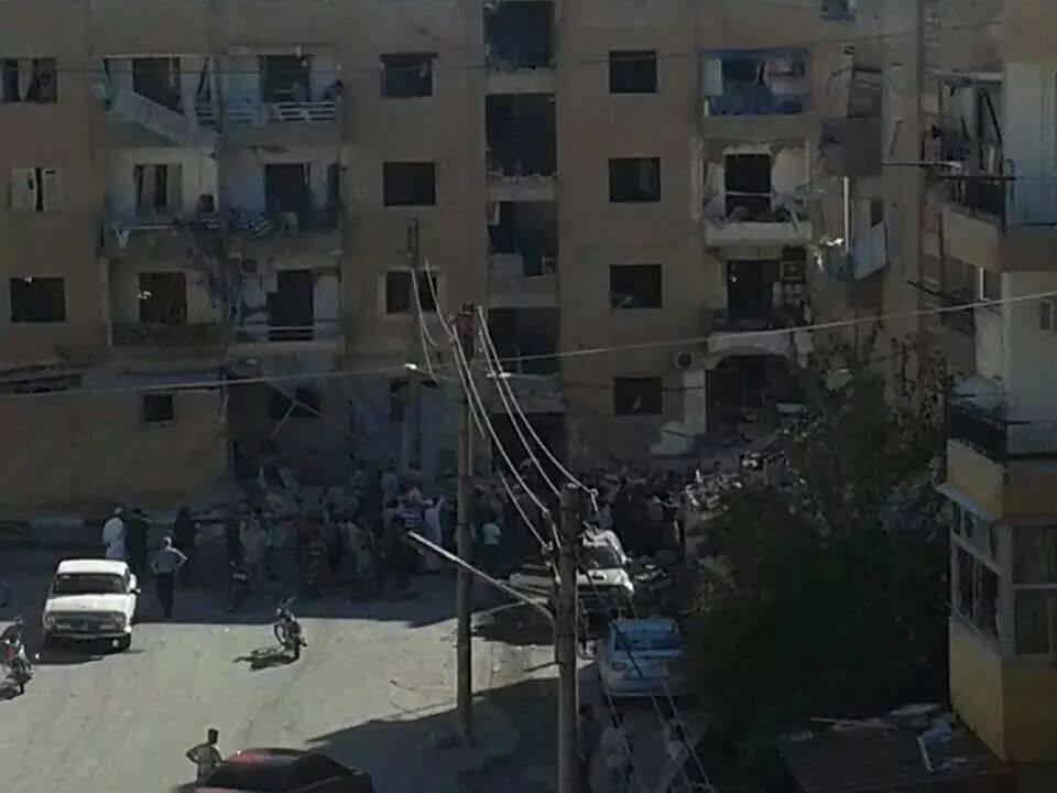 Crowds Gather Around Exploded Car, Al Tabqah Syria, September 2014