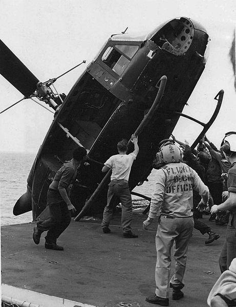 South Vietnamese Helicopter Is Pushed Overboard Off the Coast of Vietnam, Fall of Saigon, 1975