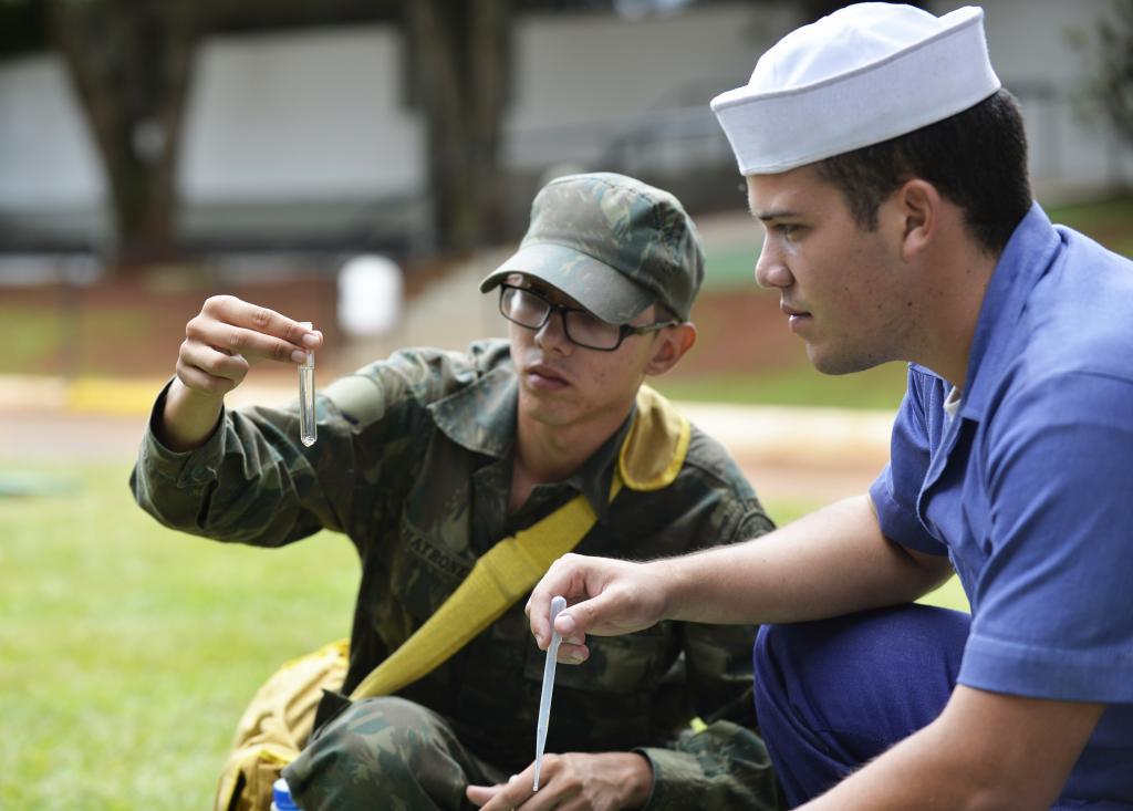 Brazilian Soldier Analyses Water from a Cistern; Brasília , Brasil, Jan 2016