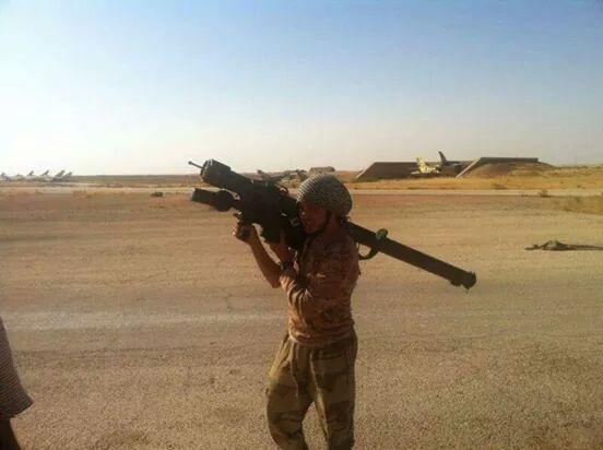 Islamic State Fighter brandishing Surface to Air Missle, Al Tabqah Syria, August 2014