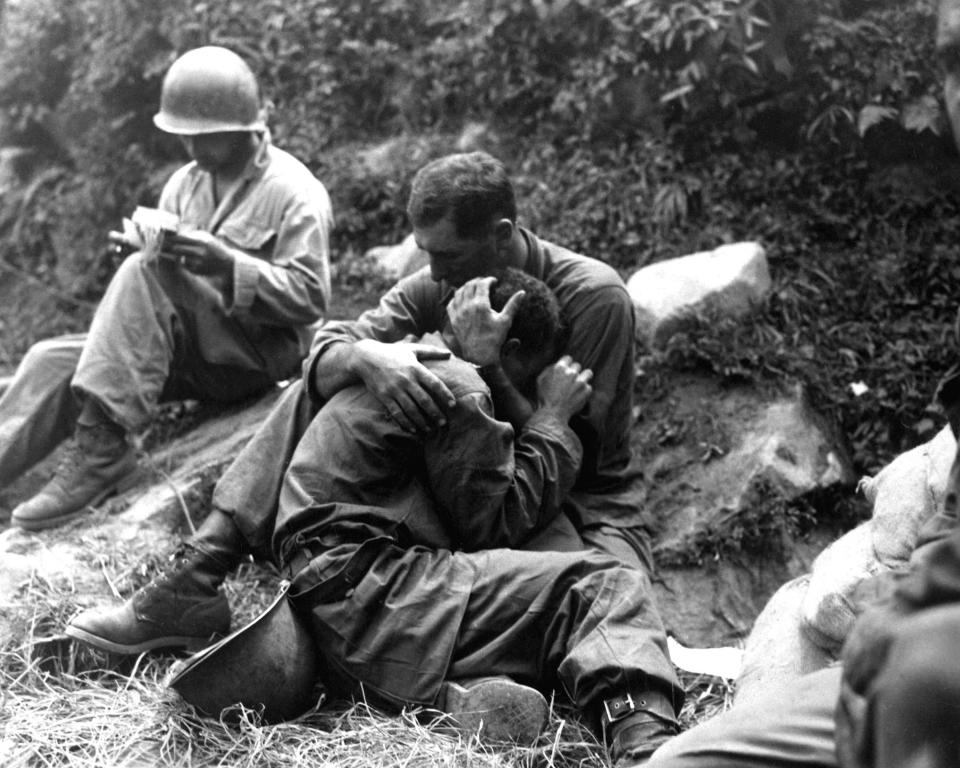 US GI Comforts Comrade, Korea, August 1950