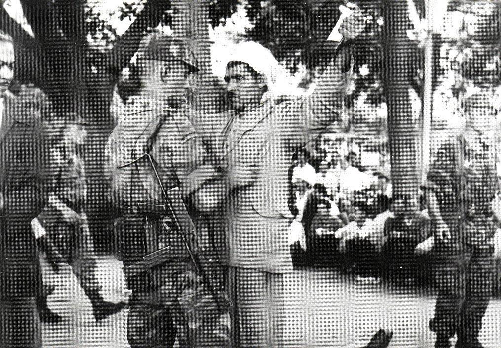 Strip search performed by a paratrooper