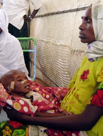 Ailing Child at Abu Shouk IDP camp; Darfur, Sudan, June 2004