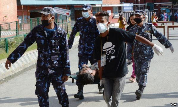 Injured man Being Carried to Hospital after Second Earthquake in Kathmandu, Nepal, May 2015