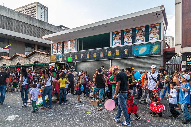 Venezuela: Maduro Posters Watch Protestors