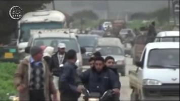 Idlib Civilians Flee to the Surrounding Countryside to Escape the Fighting