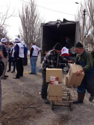 ICRC Personnel Delivering Aid