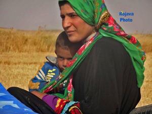 Women and Children Fleeing Northern Syria Conflict; West of Tal Abyad, Syria, June 2015