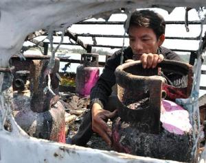 A Vietnamese fishing boat that was damaged after being fired upon by a Chinese vessel off the coast 