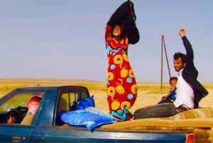 Women and Children Fleeing Northern Syria Conflict; West of Tal Abyad, Syria, June 2015