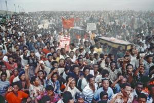 Mourners at a funeral ceremony for those who were killed by the South African police on the Internat