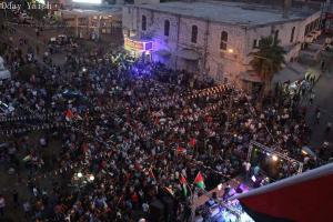 Palestinians Celebrate Raising of Flag Outside U.N. Headquarters; Nablus, Palestine, Sept 2015