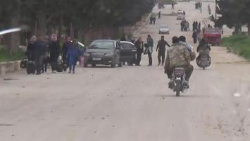 Idlib Civilians Flee to the Surrounding Countryside to Escape the Fighting