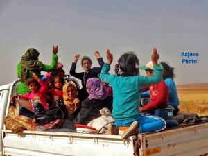 Women and Children Fleeing Northern Syria Conflict; West of Tal Abyad, Syria, June 2015