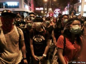 Hong Kong Occupy Protesters Face Police Teargas, September 2014